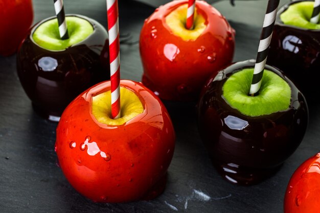 Handmade red candy apples for Halloween.