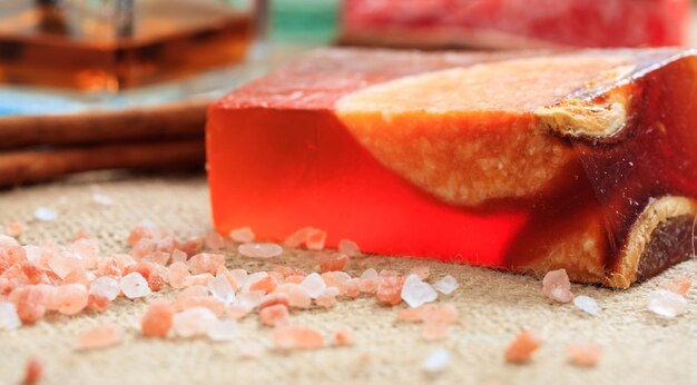 Handmade soap bar on wooden background