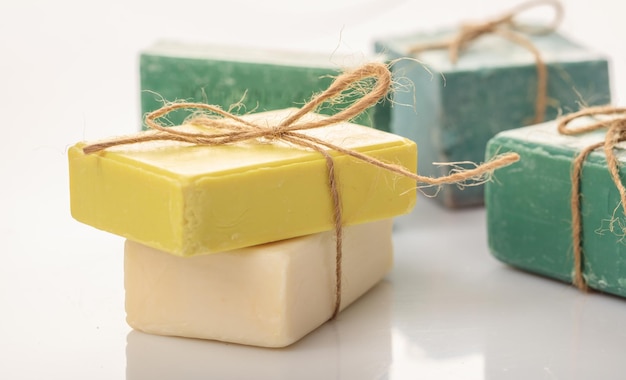 Handmade soap bars on white background