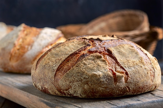 Handmade sourdough bread on a wooden shelf