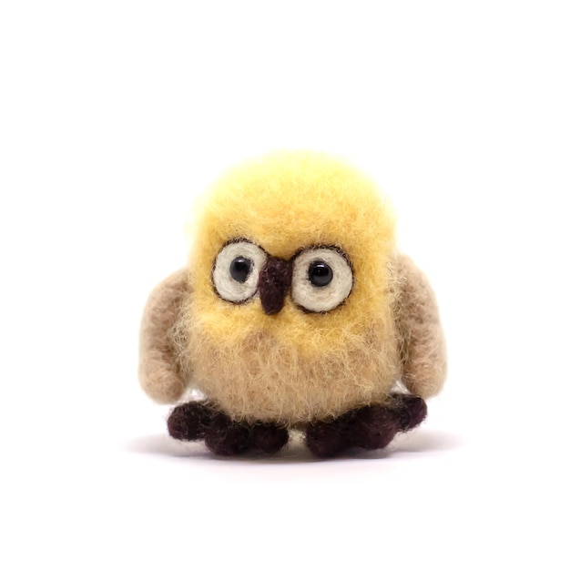 Handmade toy owl, isolate on a white background