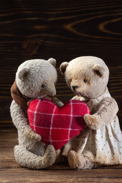 Photo handmade toy teddy bear with hearth