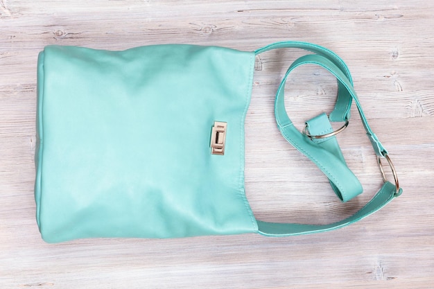 Photo handmade turquoise colour leather shoulder bag