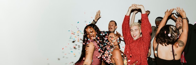 Photo hands in the air while dancing on the dance floor at a party