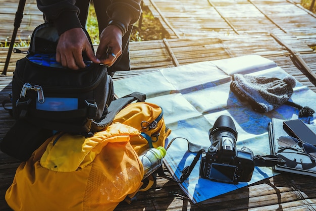 Hands are preparing the device. Explore Location Map take photos