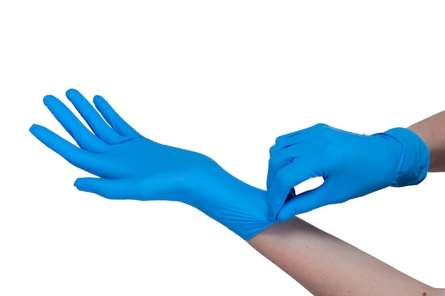 Hands in blue doctor medical latex gloves isolated on white background.