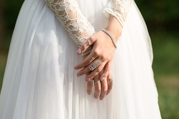 Hands of the bride close up