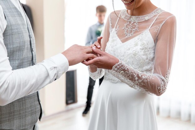 Hands of the bride and groom with wedding rings. The wedding ceremony. Love. Wedding rings