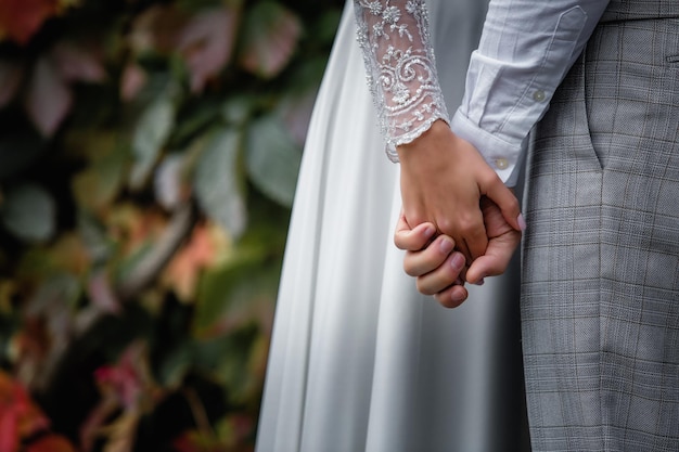 Hands of the bride and groom with wedding rings. The wedding ceremony. Love. Wedding rings