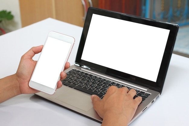 Hands of a businessman holding an empty smartphone.