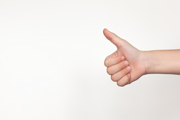 The hands of children's hands touching or pointing at something isolated on a white background