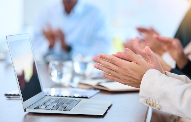 Hands clapping meeting and laptop with business team at office room table working Success teamwork or collaboration and work on corporate finance strategy planning and innovation with computer