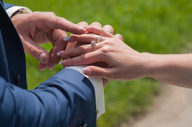 Man making proposal with the ring to his girlfriend. Put ring on hand.  Stock Photo by ©Katunya 102993974