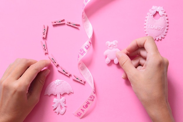 Hands decorating for newborn basket Baby decoration concept