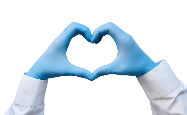 Hands of a doctor or nurse in medical gloves depict a heart on a white background caring doctor and medicine concept