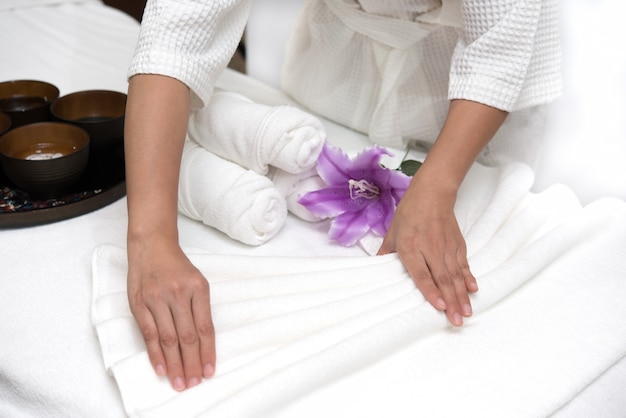 Hands of happy woman setting spa or wellness welcome