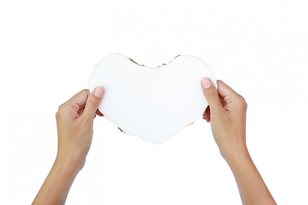 hands hold Burning paper heart on white background.