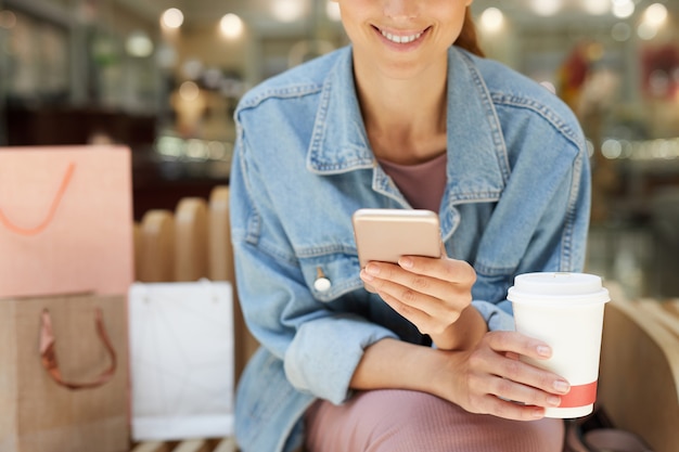 Hands holding coffee