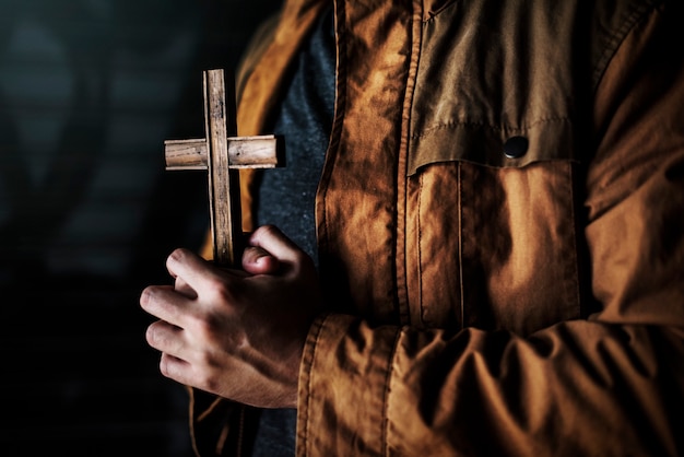 Hands Holding Cross Praying for God Religion