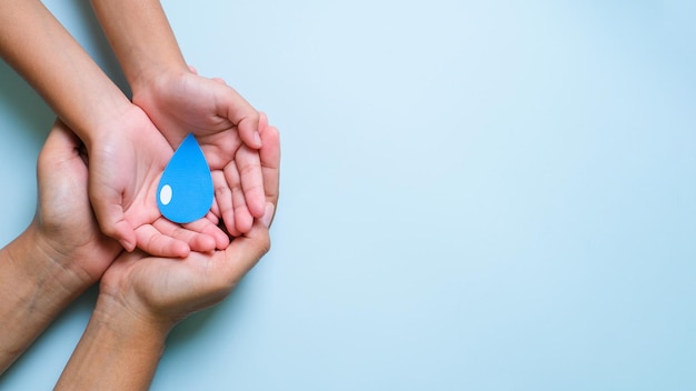 Hands holding earth globe world environment day world earth day world ocean day concept