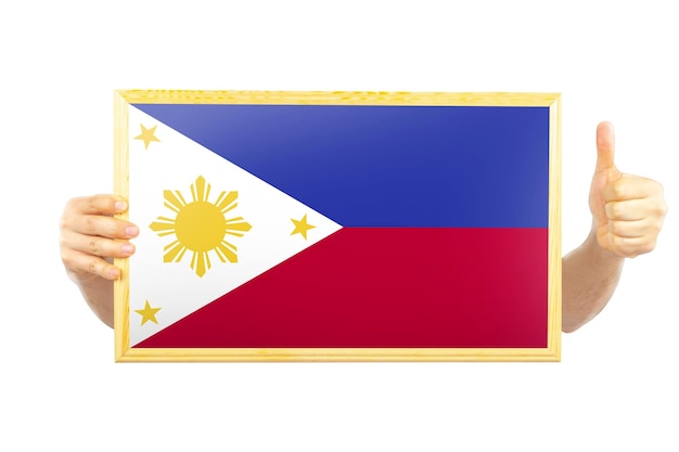 Photo hands holding a frame with philippines flag celebration or victory concept approvement or success