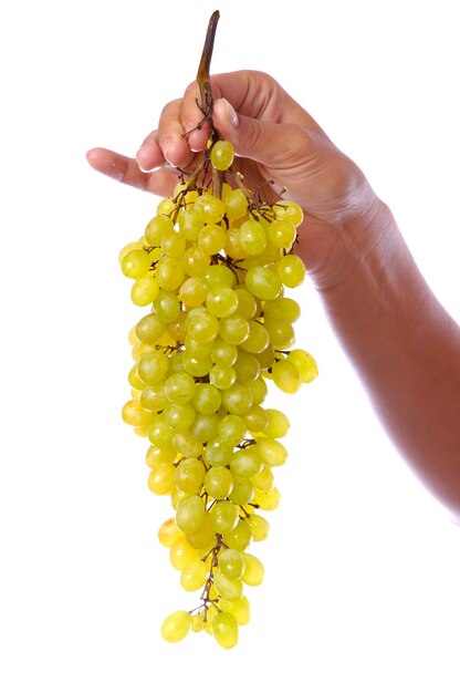 Hands holding a fresh bunch of green grapes