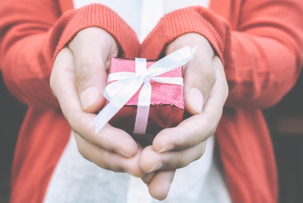 Hands holding a gift