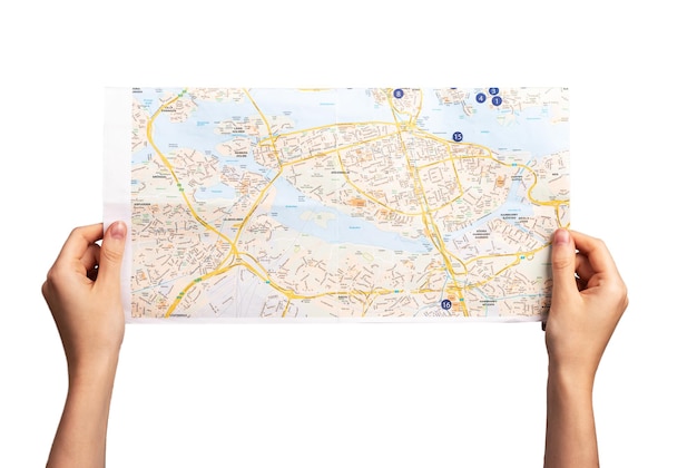 Hands holding map isolated on white background woman studying\
location for planning journey orientation in area tourism travel\
sightseeing concept