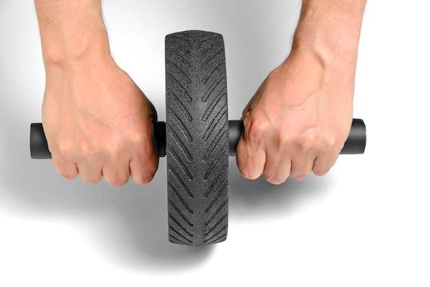 Hands holding onto press roller playing sports on white background