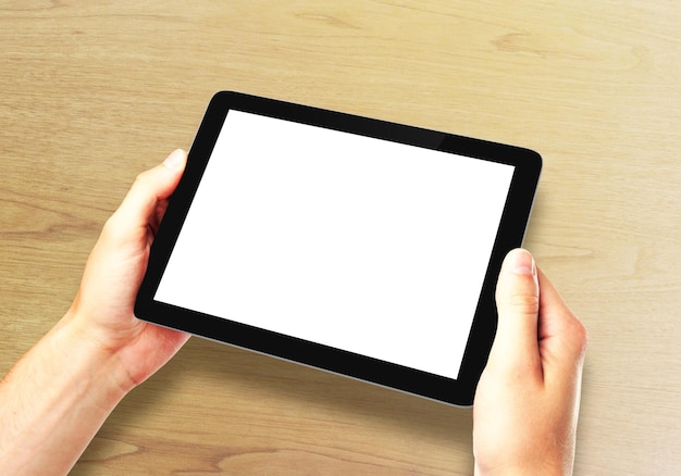 hands holding a tablet