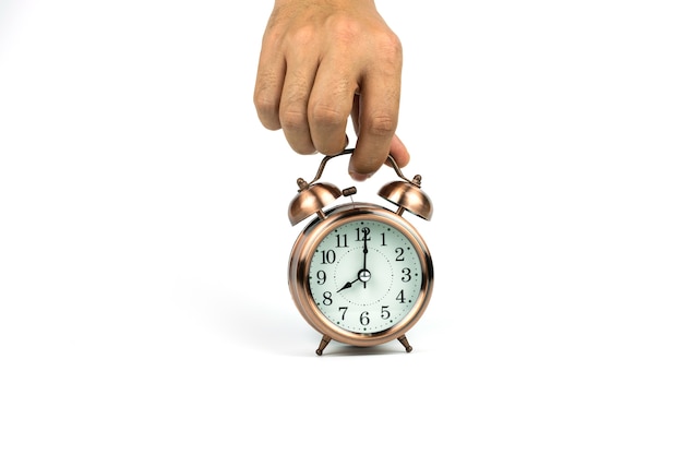 Hands holding Vintage alarm clock 