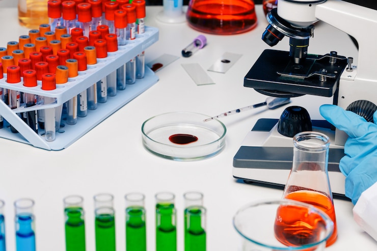 Photo hands of a laboratory worker doing blood test
