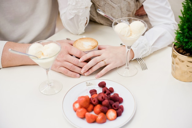 Hands of love. Ice cream.