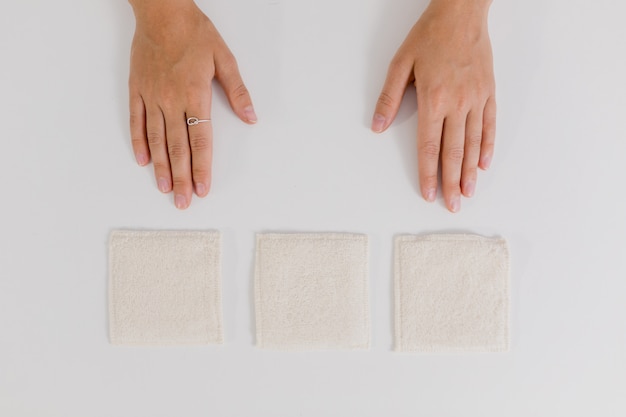 hands and make up remover pads