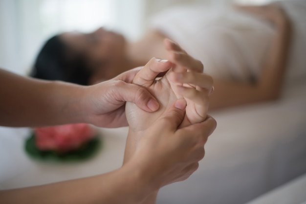 Hands massage in the spa salon 