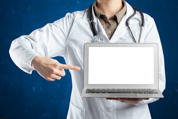 Hands of medical doctor woman with laptop