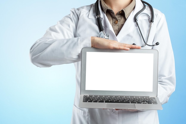 Hands of medical doctor woman with laptop