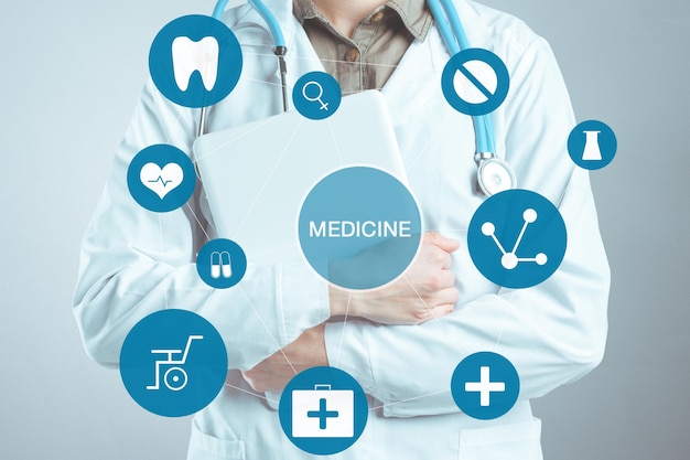 Hands of medical doctor woman with laptop