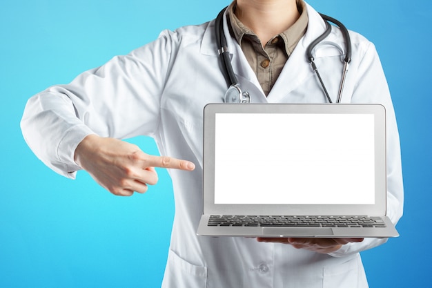 Hands of medical doctor woman with laptop