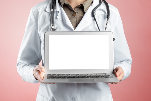 Hands of medical doctor woman with laptop