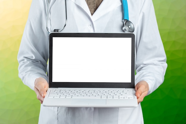 Hands of medical doctor woman with laptop