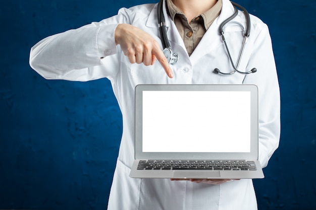 Hands of medical doctor woman with laptop