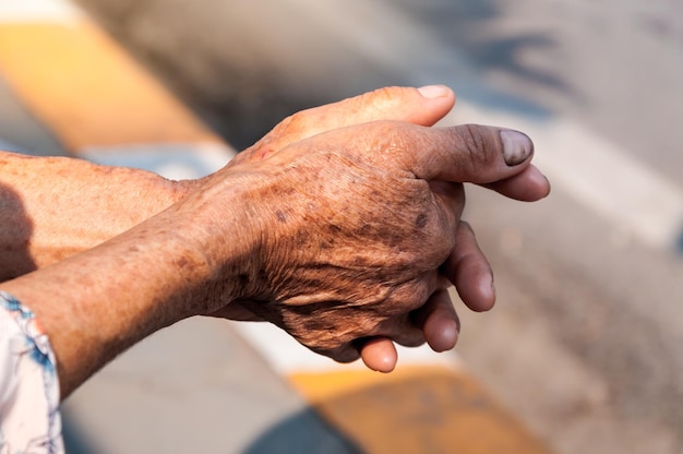 Hands of old woman,Labor hand at dirty ,concept for poverty or hunger people,human Rights,donate and charity for underprivileged elderly people in third world