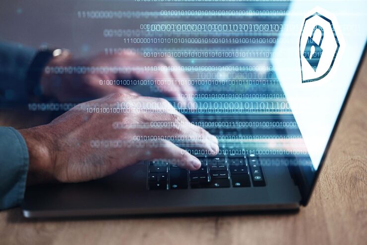 Photo hands programmer on laptop and hologram for cyber security software or binary code it typing and developer with keyboard gdpr lock and data protection for networking cloud computing and closeup