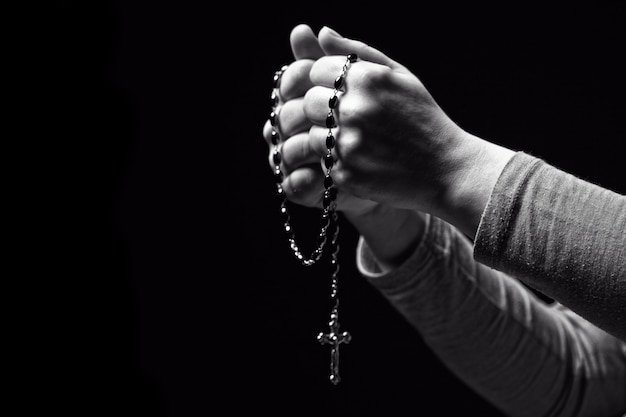 Hands and rosary