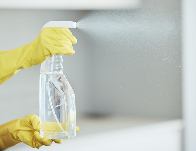 Hands rubber gloves and spray bottle with chemicals hygiene and cleaning apartment for protection Germs disinfection and product for cleanliness housekeeping and dirt in home for person