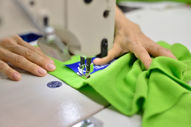 Hands of a seamstress at work