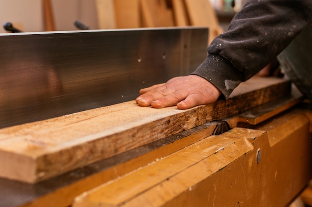 Hands of a skilled carpenter while working