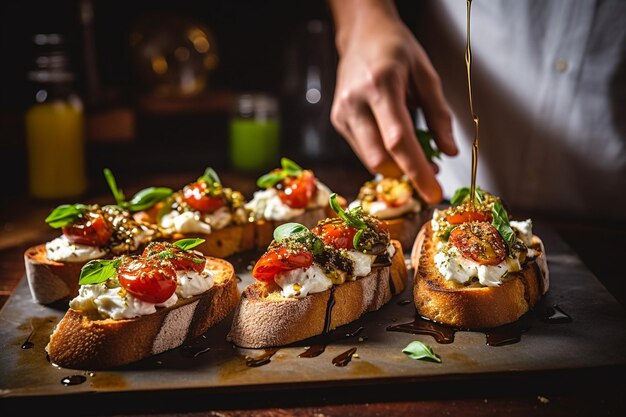 Hands spreading goat cheese on toasted baguette slices for bruschetta