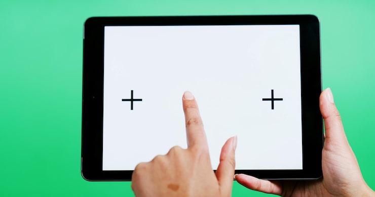 Photo hands tablet and blank screen in studio with click mock up space or ui on green background person tech and user experience with scroll point or display for interactive application with marketing